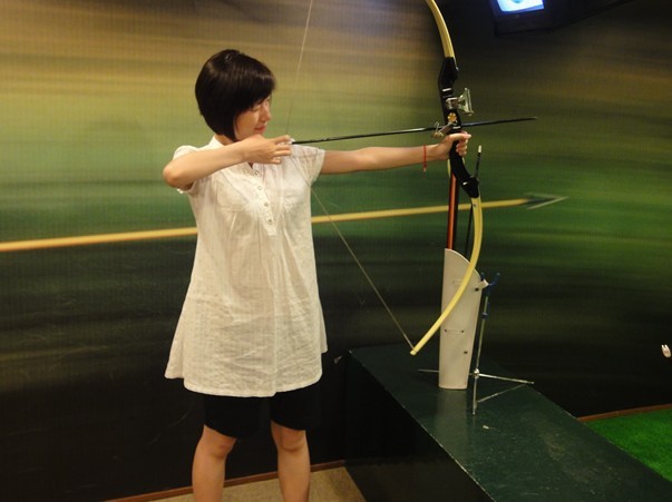 文字mud玩家照片：看姐拉弓射箭 - icefann